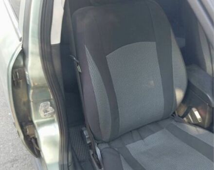 Зеленый Опель Астра, объемом двигателя 1.4 л и пробегом 290 тыс. км за 2500 $, фото 6 на Automoto.ua