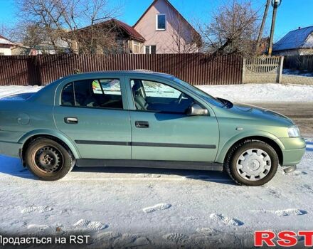 Зеленый Опель Астра, объемом двигателя 1.4 л и пробегом 143 тыс. км за 3950 $, фото 4 на Automoto.ua