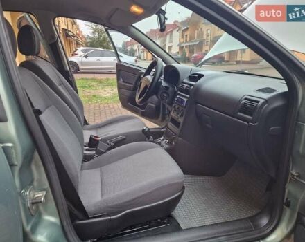 Зелений Опель Астра, об'ємом двигуна 1.36 л та пробігом 179 тис. км за 3000 $, фото 53 на Automoto.ua