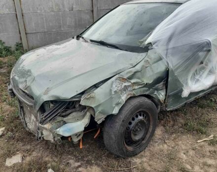 Зеленый Опель Астра, объемом двигателя 1.6 л и пробегом 190 тыс. км за 600 $, фото 1 на Automoto.ua