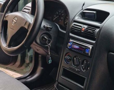 Зелений Опель Астра, об'ємом двигуна 1.36 л та пробігом 179 тис. км за 3000 $, фото 55 на Automoto.ua