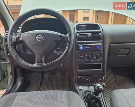 Зелений Опель Астра, об'ємом двигуна 1.36 л та пробігом 179 тис. км за 3000 $, фото 44 на Automoto.ua