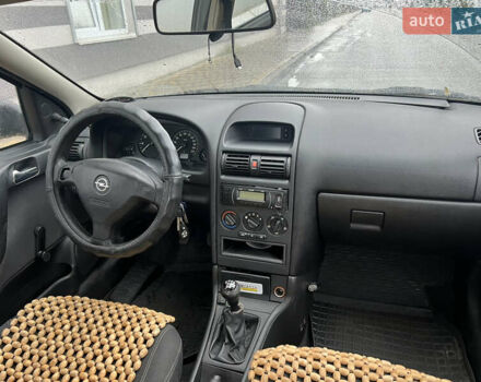 Зелений Опель Астра, об'ємом двигуна 1.36 л та пробігом 268 тис. км за 2599 $, фото 15 на Automoto.ua