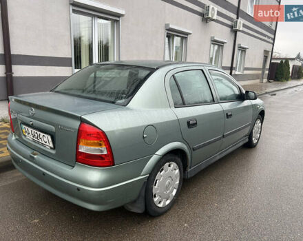 Зелений Опель Астра, об'ємом двигуна 1.36 л та пробігом 268 тис. км за 2599 $, фото 4 на Automoto.ua