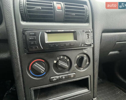 Зелений Опель Астра, об'ємом двигуна 1.36 л та пробігом 268 тис. км за 2599 $, фото 17 на Automoto.ua