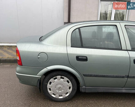 Зелений Опель Астра, об'ємом двигуна 1.36 л та пробігом 268 тис. км за 2599 $, фото 3 на Automoto.ua