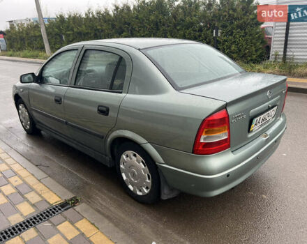 Зелений Опель Астра, об'ємом двигуна 1.36 л та пробігом 268 тис. км за 2599 $, фото 6 на Automoto.ua