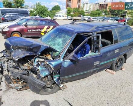 Зеленый Опель Астра, объемом двигателя 1.4 л и пробегом 350 тыс. км за 605 $, фото 4 на Automoto.ua