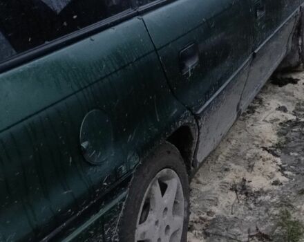 Зеленый Опель Астра, объемом двигателя 1.6 л и пробегом 360 тыс. км за 595 $, фото 1 на Automoto.ua