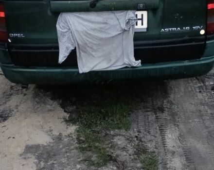 Зеленый Опель Астра, объемом двигателя 1.6 л и пробегом 360 тыс. км за 595 $, фото 3 на Automoto.ua