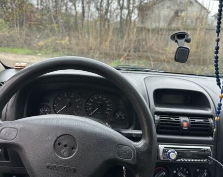 Зелений Опель Астра, об'ємом двигуна 1.6 л та пробігом 320 тис. км за 2499 $, фото 7 на Automoto.ua