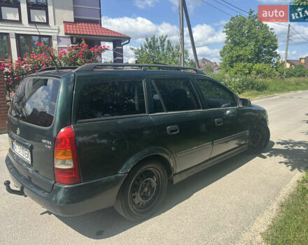 Зеленый Опель Астра, объемом двигателя 2 л и пробегом 234 тыс. км за 1750 $, фото 14 на Automoto.ua