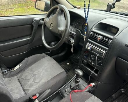 Зелений Опель Астра, об'ємом двигуна 1.6 л та пробігом 320 тис. км за 2499 $, фото 6 на Automoto.ua