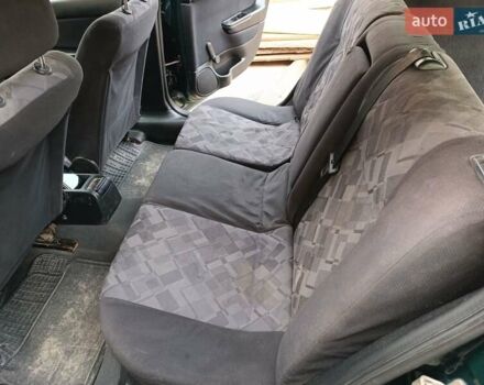 Зеленый Опель Астра, объемом двигателя 1.69 л и пробегом 320 тыс. км за 2000 $, фото 6 на Automoto.ua