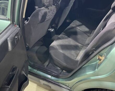 Зеленый Опель Астра, объемом двигателя 1.6 л и пробегом 250 тыс. км за 1150 $, фото 4 на Automoto.ua