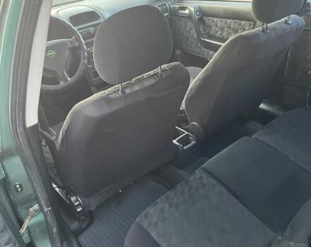 Зеленый Опель Астра, объемом двигателя 1.6 л и пробегом 227 тыс. км за 2100 $, фото 8 на Automoto.ua