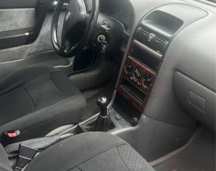 Зеленый Опель Астра, объемом двигателя 1.8 л и пробегом 245 тыс. км за 1200 $, фото 2 на Automoto.ua