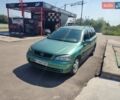 Зеленый Опель Астра, объемом двигателя 2 л и пробегом 410 тыс. км за 2900 $, фото 6 на Automoto.ua