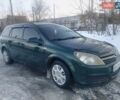 Зеленый Опель Астра, объемом двигателя 1.6 л и пробегом 318 тыс. км за 4000 $, фото 1 на Automoto.ua
