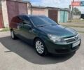 Зеленый Опель Астра, объемом двигателя 1.6 л и пробегом 263 тыс. км за 4950 $, фото 2 на Automoto.ua
