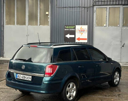 Зеленый Опель Астра, объемом двигателя 1.6 л и пробегом 210 тыс. км за 3999 $, фото 3 на Automoto.ua