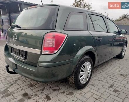 Зеленый Опель Астра, объемом двигателя 1.6 л и пробегом 206 тыс. км за 5450 $, фото 14 на Automoto.ua