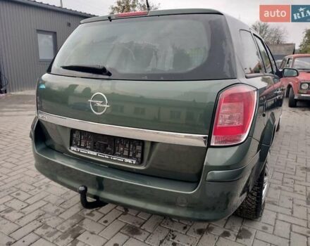 Зеленый Опель Астра, объемом двигателя 1.6 л и пробегом 206 тыс. км за 5450 $, фото 12 на Automoto.ua
