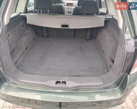 Зеленый Опель Астра, объемом двигателя 1.6 л и пробегом 206 тыс. км за 5450 $, фото 3 на Automoto.ua