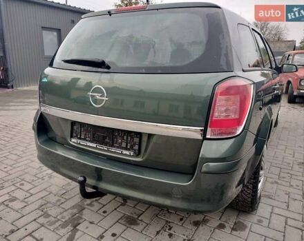 Зеленый Опель Астра, объемом двигателя 1.6 л и пробегом 206 тыс. км за 5200 $, фото 7 на Automoto.ua