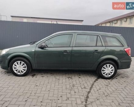 Зеленый Опель Астра, объемом двигателя 1.6 л и пробегом 206 тыс. км за 5450 $, фото 6 на Automoto.ua