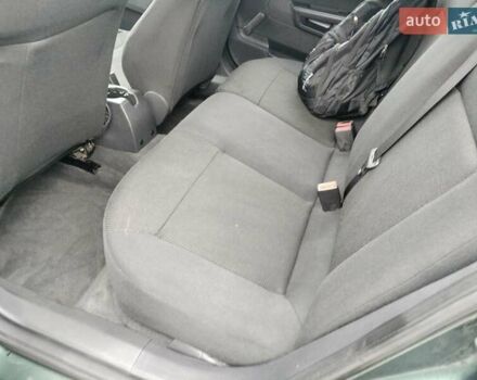 Зеленый Опель Астра, объемом двигателя 1.6 л и пробегом 206 тыс. км за 5450 $, фото 2 на Automoto.ua