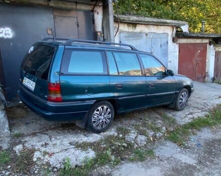 Зеленый Опель Астра, объемом двигателя 1.6 л и пробегом 280 тыс. км за 552 $, фото 1 на Automoto.ua