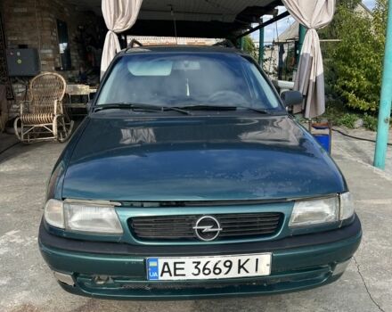 Зеленый Опель Астра, объемом двигателя 1.6 л и пробегом 170 тыс. км за 879 $, фото 1 на Automoto.ua