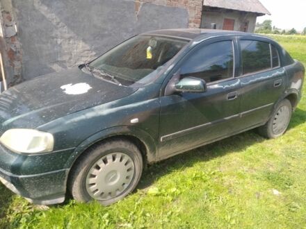 Зеленый Опель Астра, объемом двигателя 1.4 л и пробегом 320 тыс. км за 1400 $, фото 1 на Automoto.ua