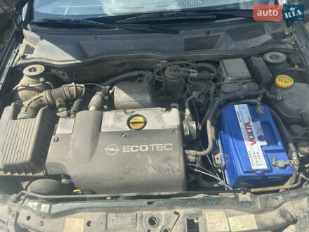 Зеленый Опель Астра, объемом двигателя 2 л и пробегом 234 тыс. км за 1750 $, фото 1 на Automoto.ua