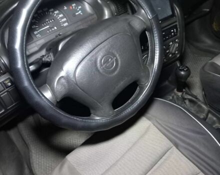 Зеленый Опель Астра, объемом двигателя 1.4 л и пробегом 279 тыс. км за 1250 $, фото 1 на Automoto.ua