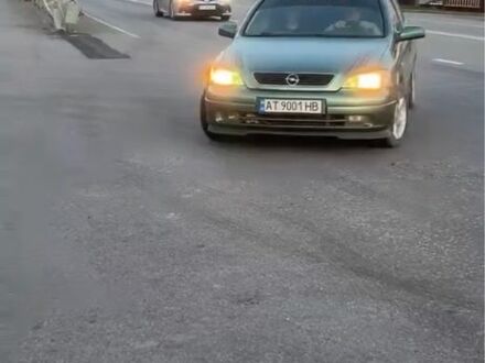 Зеленый Опель Астра, объемом двигателя 1.6 л и пробегом 350 тыс. км за 2500 $, фото 1 на Automoto.ua