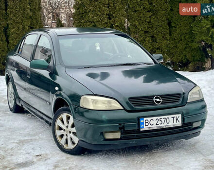 Зеленый Опель Астра, объемом двигателя 1.4 л и пробегом 180 тыс. км за 1600 $, фото 1 на Automoto.ua