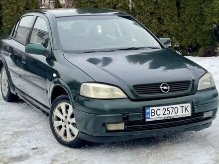 Зеленый Опель Астра, объемом двигателя 1.4 л и пробегом 400 тыс. км за 1800 $, фото 1 на Automoto.ua
