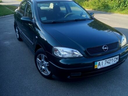 Зеленый Опель Астра, объемом двигателя 1.6 л и пробегом 269 тыс. км за 4200 $, фото 1 на Automoto.ua