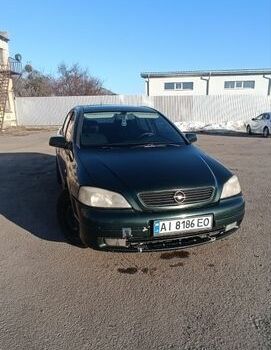 Зеленый Опель Астра, объемом двигателя 1.8 л и пробегом 230 тыс. км за 2500 $, фото 1 на Automoto.ua