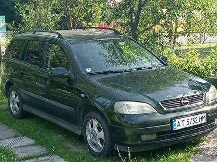 Зелений Опель Астра, об'ємом двигуна 2 л та пробігом 315 тис. км за 2950 $, фото 1 на Automoto.ua