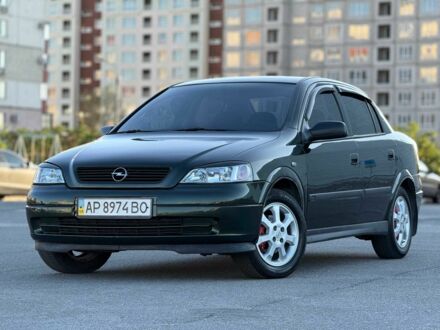 Зеленый Опель Астра, объемом двигателя 1.4 л и пробегом 204 тыс. км за 3499 $, фото 1 на Automoto.ua