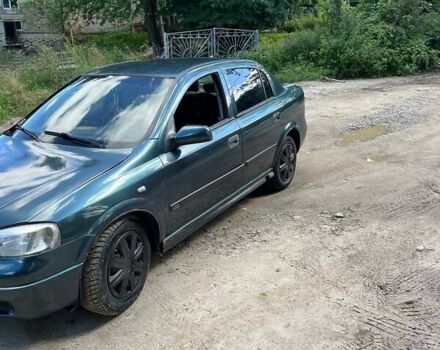 Зеленый Опель Астра, объемом двигателя 1.4 л и пробегом 210 тыс. км за 2000 $, фото 1 на Automoto.ua
