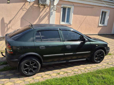 Зеленый Опель Астра, объемом двигателя 2 л и пробегом 425 тыс. км за 1950 $, фото 1 на Automoto.ua