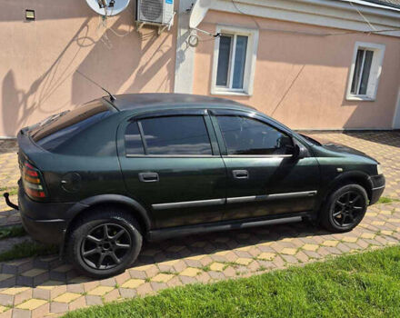 Зеленый Опель Астра, объемом двигателя 2 л и пробегом 425 тыс. км за 1950 $, фото 1 на Automoto.ua