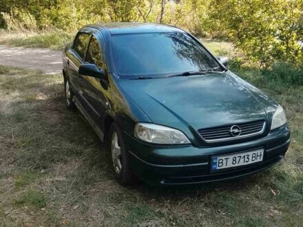 Зеленый Опель Астра, объемом двигателя 1.6 л и пробегом 320 тыс. км за 2064 $, фото 1 на Automoto.ua