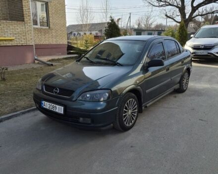 Зеленый Опель Астра, объемом двигателя 1.4 л и пробегом 350 тыс. км за 2500 $, фото 1 на Automoto.ua