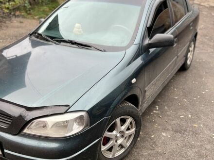 Зеленый Опель Астра, объемом двигателя 1.6 л и пробегом 320 тыс. км за 3600 $, фото 1 на Automoto.ua