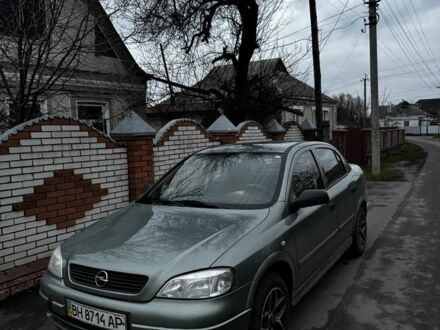 Зеленый Опель Астра, объемом двигателя 1.4 л и пробегом 206 тыс. км за 4000 $, фото 1 на Automoto.ua